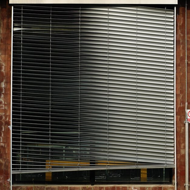 Punched roller shutter for retail